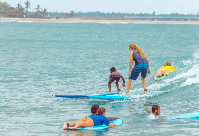 Family enjoying a beach day with kids in Sri Lanka